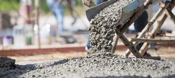 Preparing Concrete For Resurfacing This image shows cement being poured.