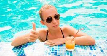 Pool Tile Cleaning This image shows a woman doing a thumbs-up sign.