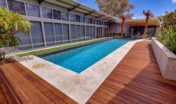 commercial-residential-pool-deck-repair This image shows a pool with a newly resurfaced deck.