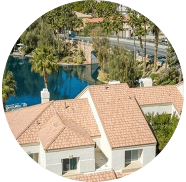 Desert Shores, Las Vegas, NV copy This image shows a house with a lake behind it.