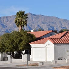 North-Las-Vegas This image shows a house in Las Vegas with a mountain behind it.